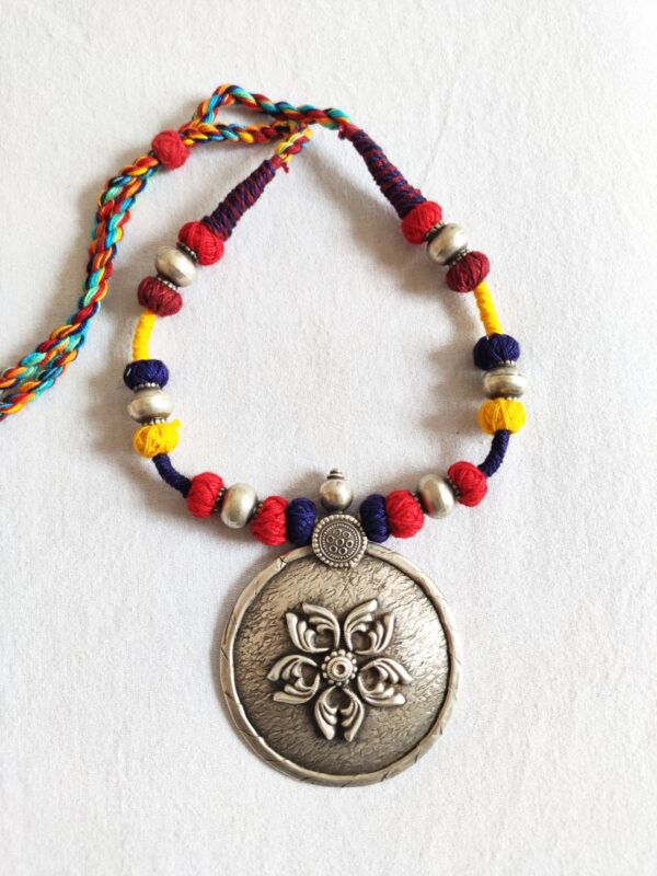 Statement Silver Pendant in Multicolor Cotton Weave - Image 2